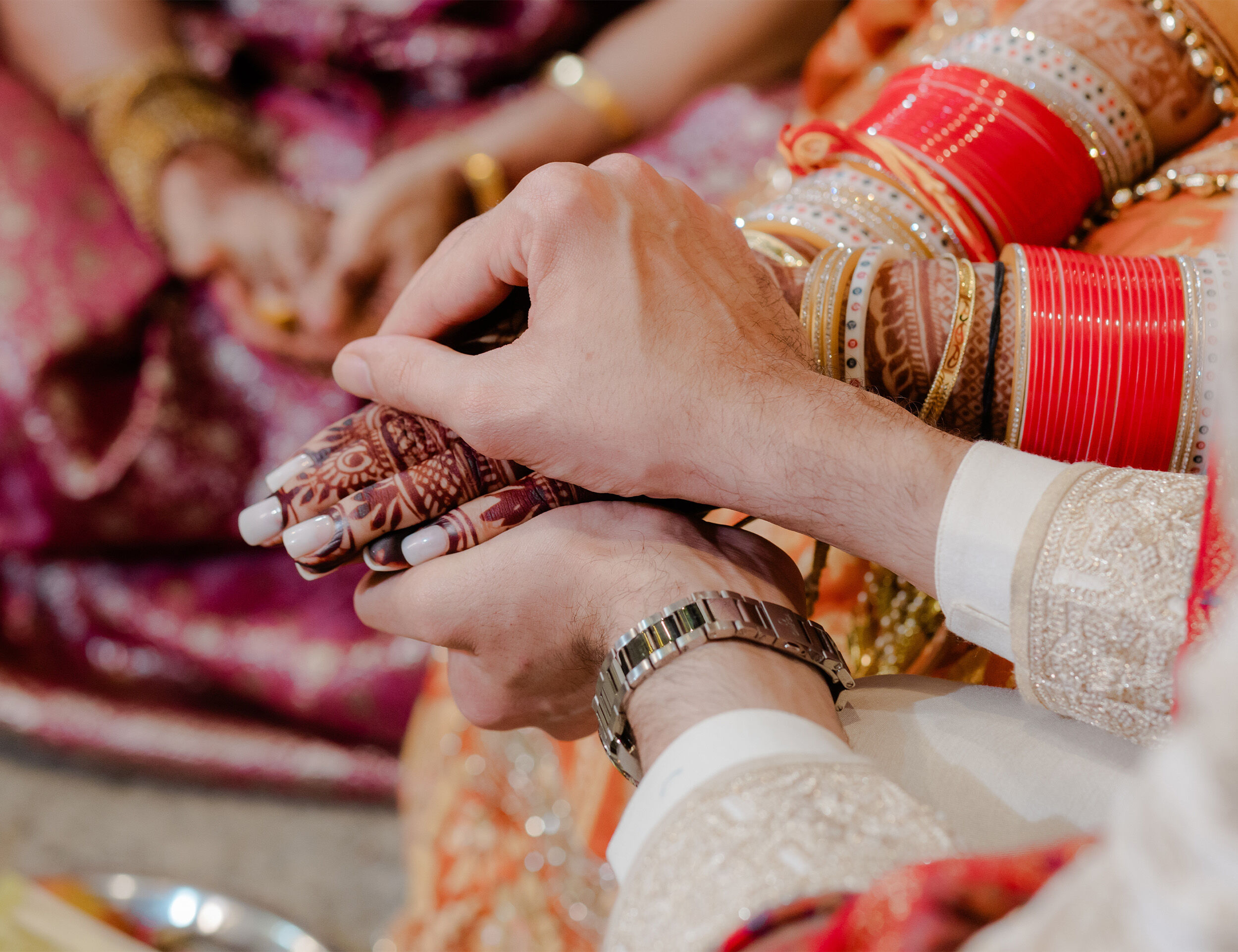 A bride and groom doing rituals on their wedding day